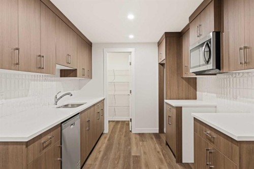 62 Setonvista Grove Se, Calgary, AB - Indoor Photo Showing Kitchen