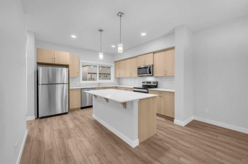 164 Legacy Reach Close Se, Calgary, AB - Indoor Photo Showing Kitchen With Stainless Steel Kitchen With Upgraded Kitchen
