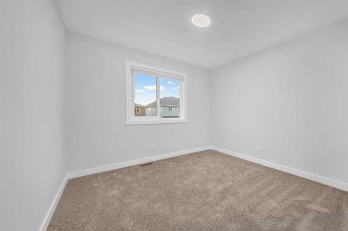 164 Legacy Reach Close Se, Calgary, AB - Indoor Photo Showing Other Room