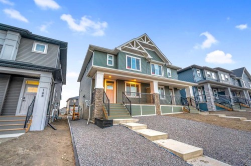 164 Legacy Reach Close Se, Calgary, AB - Outdoor With Deck Patio Veranda With Facade