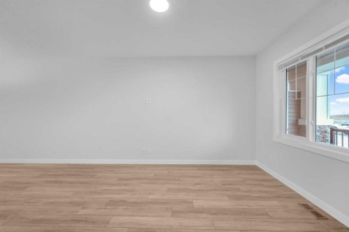 164 Legacy Reach Close Se, Calgary, AB - Indoor Photo Showing Other Room