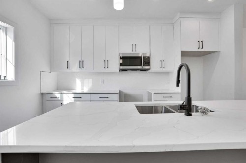 59 Baysprings Terrace Sw, Airdrie, AB - Indoor Photo Showing Kitchen