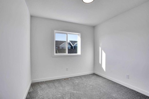 59 Baysprings Terrace Sw, Airdrie, AB - Indoor Photo Showing Other Room