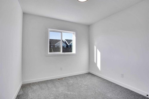 59 Baysprings Terrace Sw, Airdrie, AB - Indoor Photo Showing Other Room