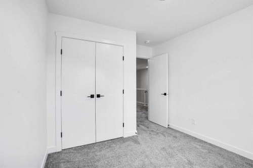 59 Baysprings Terrace Sw, Airdrie, AB - Indoor Photo Showing Other Room