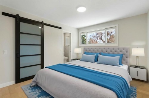 924 Canna Crescent Sw, Calgary, AB - Indoor Photo Showing Bedroom