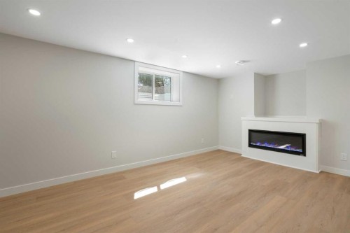 924 Canna Crescent Sw, Calgary, AB - Indoor With Fireplace