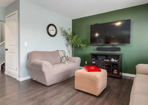 37 Cimarron Meadows Bay, Okotoks, AB - Indoor Photo Showing Living Room
