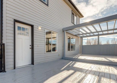 37 Cimarron Meadows Bay, Okotoks, AB - Outdoor With Deck Patio Veranda With Exterior