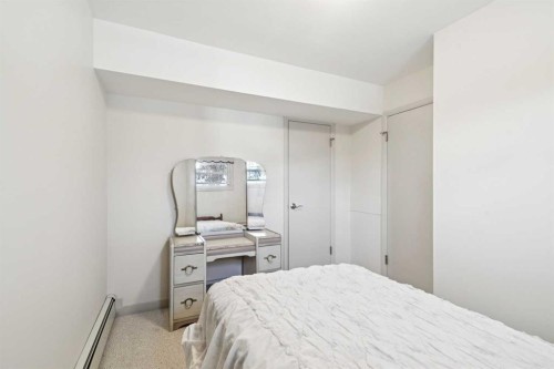 1228 Richland Road Ne, Calgary, AB - Indoor Photo Showing Bedroom