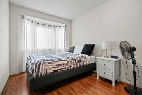 6938 Laguna Way Ne, Calgary, AB - Indoor Photo Showing Bedroom