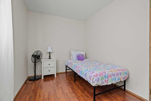 6938 Laguna Way Ne, Calgary, AB - Indoor Photo Showing Bedroom