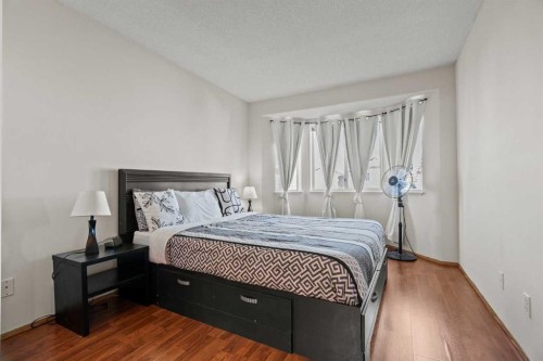 6938 Laguna Way Ne, Calgary, AB - Indoor Photo Showing Bedroom