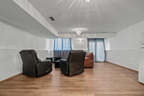 6938 Laguna Way Ne, Calgary, AB - Indoor Photo Showing Other Room