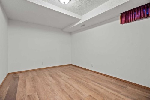 6938 Laguna Way Ne, Calgary, AB - Indoor Photo Showing Other Room