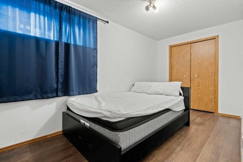 6938 Laguna Way Ne, Calgary, AB - Indoor Photo Showing Bedroom
