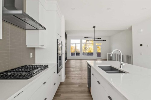 2507 Sovereign Crescent Sw, Calgary, AB - Indoor Photo Showing Kitchen With Double Sink With Upgraded Kitchen