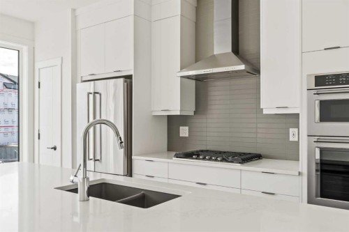 2507 Sovereign Crescent Sw, Calgary, AB - Indoor Photo Showing Kitchen With Double Sink With Upgraded Kitchen