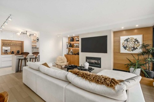 71D-231 Heritage Drive Se, Calgary, AB - Indoor Photo Showing Living Room With Fireplace