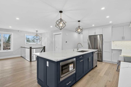3704 58 Avenue Sw, Calgary, AB - Indoor Photo Showing Kitchen With Stainless Steel Kitchen With Double Sink With Upgraded Kitchen