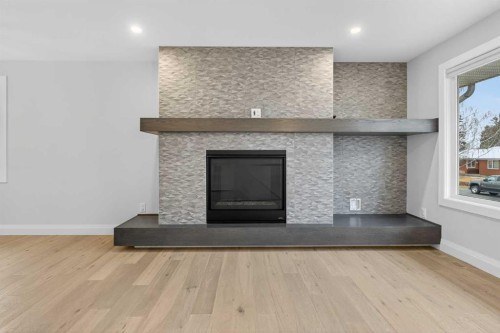 3704 58 Avenue Sw, Calgary, AB - Indoor With Fireplace