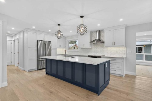 3704 58 Avenue Sw, Calgary, AB - Indoor Photo Showing Kitchen With Stainless Steel Kitchen With Upgraded Kitchen