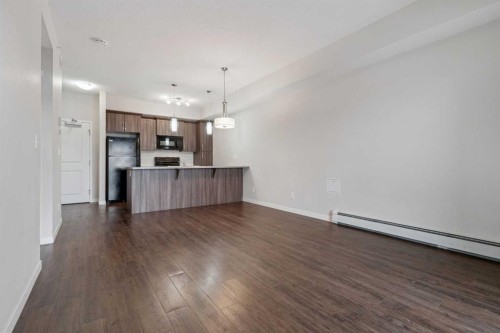 9314-101 Sunset Drive, Cochrane, AB - Indoor Photo Showing Kitchen