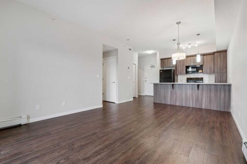 9314-101 Sunset Drive, Cochrane, AB - Indoor Photo Showing Kitchen