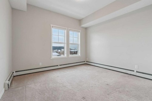 9314-101 Sunset Drive, Cochrane, AB - Indoor Photo Showing Other Room