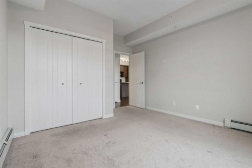 9314-101 Sunset Drive, Cochrane, AB - Indoor Photo Showing Other Room
