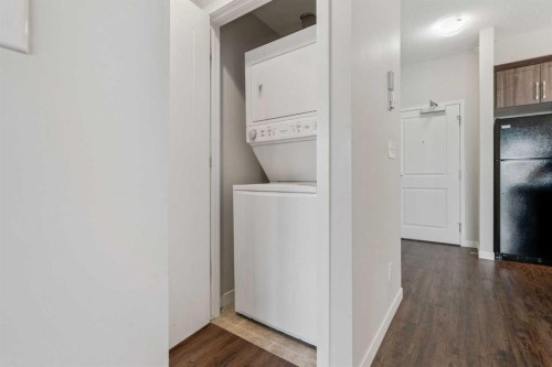 9314-101 Sunset Drive, Cochrane, AB - Indoor Photo Showing Laundry Room
