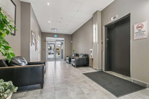 9314-101 Sunset Drive, Cochrane, AB - Indoor Photo Showing Other Room