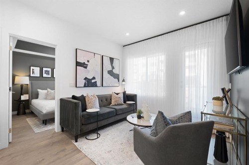 3314-6 Merganser Drive West, Chestermere, AB - Indoor Photo Showing Living Room