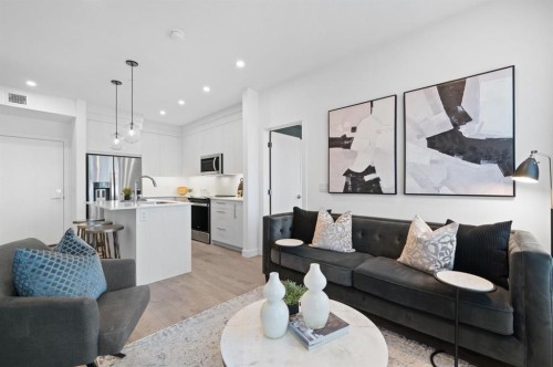 3314-6 Merganser Drive West, Chestermere, AB - Indoor Photo Showing Living Room