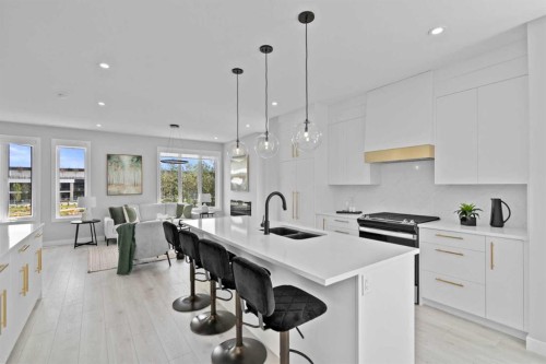 501-8155 8 Avenue Sw, Calgary, AB - Indoor Photo Showing Kitchen With Double Sink With Upgraded Kitchen