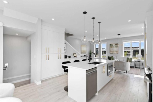 501-8155 8 Avenue Sw, Calgary, AB - Indoor Photo Showing Kitchen With Upgraded Kitchen