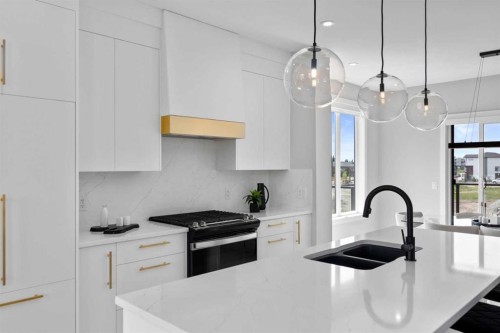 501-8155 8 Avenue Sw, Calgary, AB - Indoor Photo Showing Kitchen With Double Sink With Upgraded Kitchen