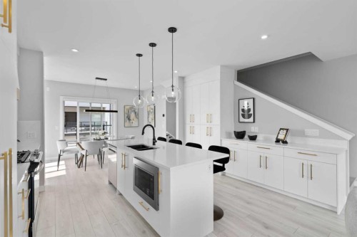 501-8155 8 Avenue Sw, Calgary, AB - Indoor Photo Showing Kitchen With Double Sink With Upgraded Kitchen