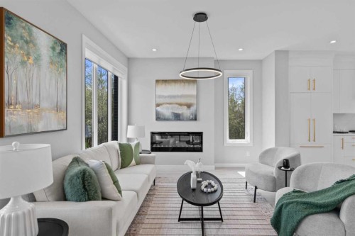 501-8155 8 Avenue Sw, Calgary, AB - Indoor Photo Showing Living Room With Fireplace