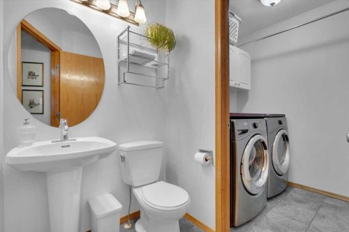 507 Sheep River Close, Okotoks, AB - Indoor Photo Showing Laundry Room