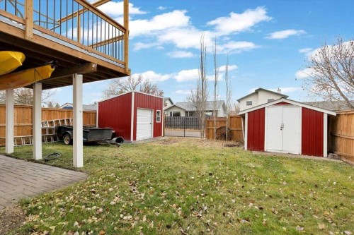 507 Sheep River Close, Okotoks, AB - Outdoor With Deck Patio Veranda