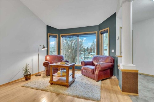 507 Sheep River Close, Okotoks, AB - Indoor Photo Showing Living Room