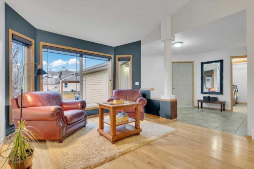 507 Sheep River Close, Okotoks, AB - Indoor Photo Showing Living Room