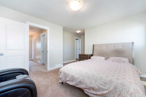 220 Bayside Point Sw, Airdrie, AB - Indoor Photo Showing Bedroom