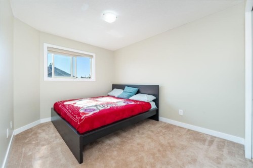 220 Bayside Point Sw, Airdrie, AB - Indoor Photo Showing Bedroom