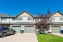 220 Bayside Point Sw, Airdrie, AB  - Outdoor With Facade 