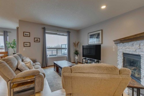 100 Royal Oak Terrace Nw, Calgary, AB - Indoor Photo Showing Living Room With Fireplace