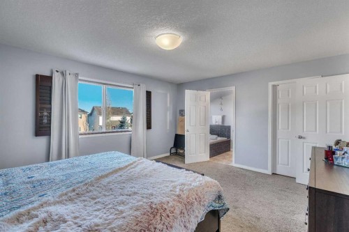6 Morningside Landing Sw, Airdrie, AB - Indoor Photo Showing Bedroom