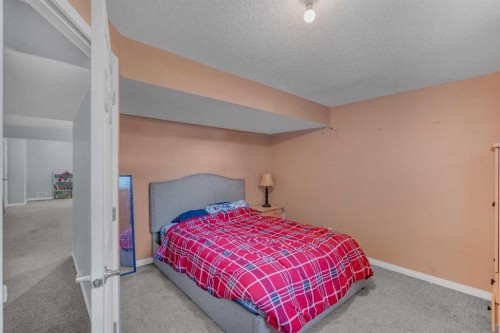 6 Morningside Landing Sw, Airdrie, AB - Indoor Photo Showing Bedroom