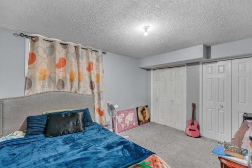 6 Morningside Landing Sw, Airdrie, AB - Indoor Photo Showing Bedroom